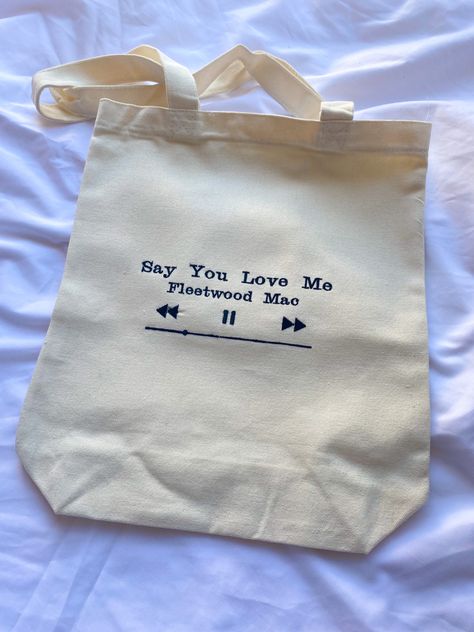 Embroidered Custom Song Tote Bag Example says Say you love me by Fleetwood Mac Canvas Bag Art Ideas, Toat Bags Design Diy, Cute Tote Bags Design, Custom Tote Bags Painting, Tote Bag Inspo Aesthetic, How To Make Tote Bags, Tote Bag Paint Ideas, Cute Tote Bag Ideas, Tote Bag Embroidery Ideas Aesthetic