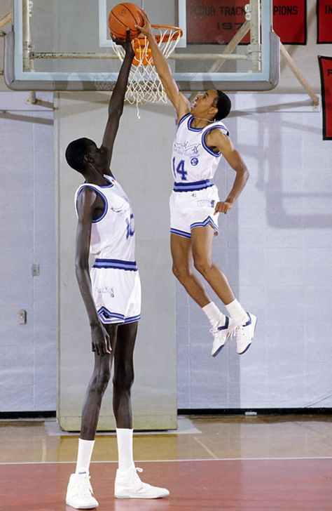 Manute Bol: Classic Photos | Sports Illustrated Manute Bol, Spud Webb, Michael Jordan Pictures, Michael Jordan Basketball, Basketball Socks, Basketball Leagues, Basketball Legends, History Photos, Photo Blog