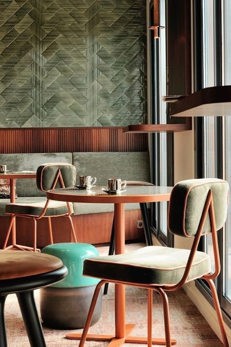 The State chair is a striking chair perfect for restuarant and cafe seating. In this image you can see Sage green upholstered back and seat which is complimented by terracotta piping and lacquered metal structure, however there is a range of other colours available. Chair Cafe Design, Ceiling Ideas Living Room, Table Ronde Design, Bistro Interior, Striped Tile, Creative Tile, Cafe Seating, Restaurant Seating, Chaise Metal