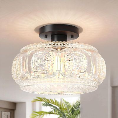 This semi-flush ceiling light comes with beautiful premium glass shade and a matte gold metal base, which can be used not only as a vintage look lighting, but also a modern life decoration. This ceiling light fixture is suitable for varies of decor styles, which looks kind of vintage but modern at the same time. Great for entry way, bathroom, bedroom, living room, dining room, kitchen, hallway, farmhouses and any living area. Fixture Finish: Black | House of Hampton® Keidy Glass Flush Mount Glas Flush Mount Ceiling Lights White, Hallway Light Fixtures, Glass Ceiling Light, Black Light Fixture, Glass Ceiling Lights, Semi Flush Ceiling Lights, Ceiling Light Fixture, Light Fixtures Flush Mount, Flush Mount Ceiling Light