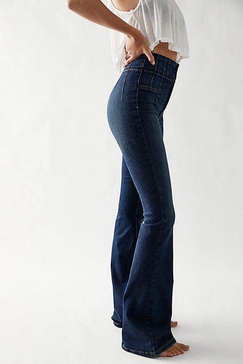 Forever flattering and flared jeans from our We The Free collection. **Fit:** Super high-rise, flared silhouette **Features:** Exaggerated yoking throughout, stretch denim fabrication, exposed button fly, flattering flat front and back **Why We | We The Free Jayde Flare Jeans at Free People in Dark Wash, Size: 33 2010s Fashion Women, Concert Outfit Fall, Blue Flare Jeans, Blue Jean Outfits, Fiesta Outfit, Fall Pants, All Jeans, Blue Fits, Petite Jeans