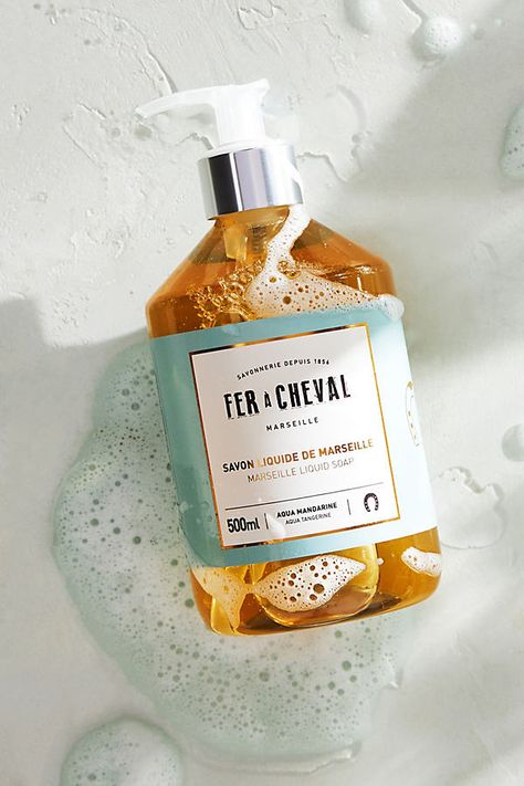 Formulated with a nourishing blend of coconut, sweet almond, olive, and argan oils, this perfumed soap keeps your skin feeling hydrated through frequent hand washing. Featuring scents that are equal parts elegant, invigorating, and refreshing, each is sure to leave a lasting impression. About Fer A ChevalNamed after the French term for 'horseshoe,' Fer a Cheval is the oldest Marseille soap factory that still uses traditional, age-old methods and recipes. The brand has been in operation since 185 Marseille, Hand Soap Packaging, Ingredients Photography, Soap Photography, Soap Packaging Design, Marseille Soap, Liquid Hand Soap, Social Media Design Inspiration, Soap Packaging