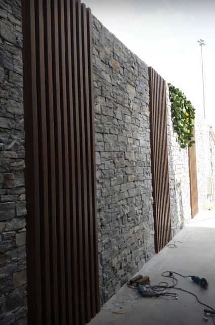 20 Modern Compound Wall Elevation Designs In 2023 Modern Compound Wall, Wall Elevation, Wall Cladding Designs, Fence Wall Design, Compound Wall Design, Front Wall Design, Garden Wall Designs, Exterior Wall Cladding, House Fence Design