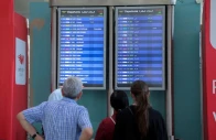 people look at flight information boards at the beirut rafic hariri international airport in beirut lebanon on july 28 2024 photo reuters