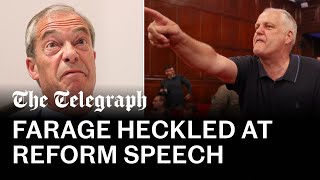 video: Farage heckled several times at chaotic Reform speech