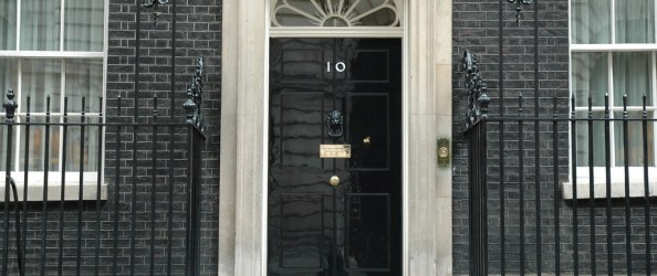 Front door of Number 10 Downing Street, along with the two windows either side.