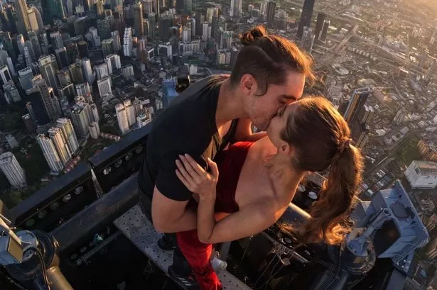 Daredevil Russian couple Angela Nikolau and Ivan Beerkus share a kiss among the clouds in vertigo-inducing Netflix documentary Skywalkers: A Love Story