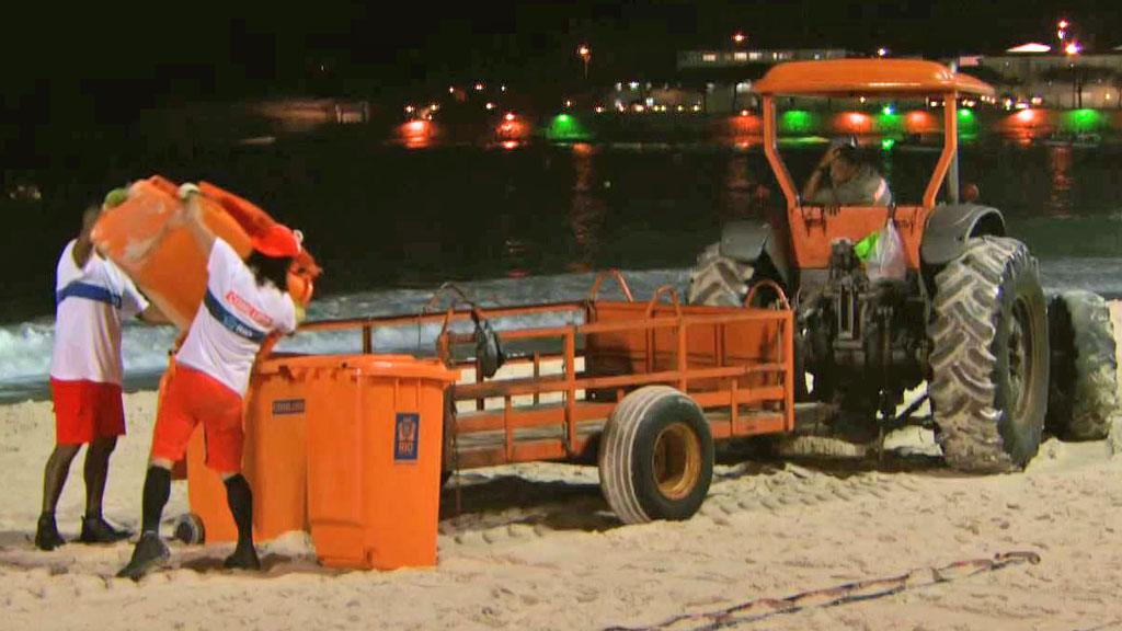 Bin men on Copacabana beach, Rio de Janeiro