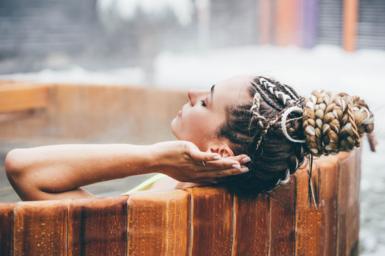 Lady relaxing in a hot tub