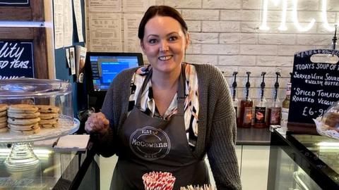 Clare McCowan behind the counter at her café