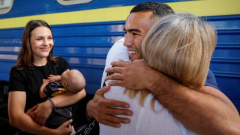 A silver medallist of 2020 Tokyo Olympics and a member of the Ukrainian Olympic wrestling team Parviz Nasibov says goodbye to his family before boarding a train to the Paris 2024 Olympics