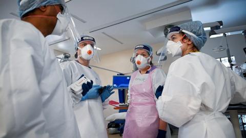 Staff at University Hospital Monklands meet to discuss patient care on the ICU ward on February 5, 2021 in Airdrie, Scotland