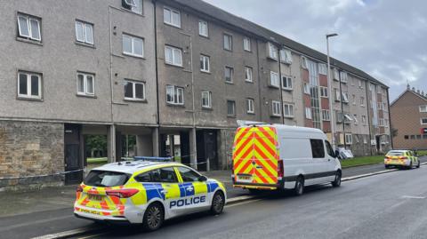 Police at the scene in George Street, Paisley