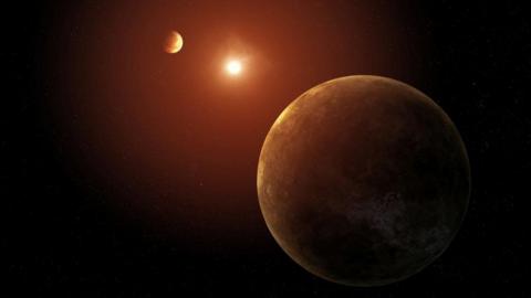 Artist's concept showing two of the seven planets discovered orbiting a sun-like star.