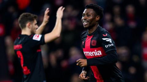 Bayer Leverkusen celebrate scoring against Wolfsburg