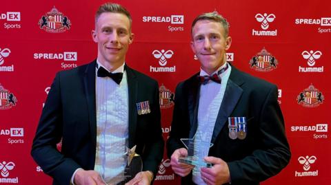 Mike and Kev Sutcliffe with their awards