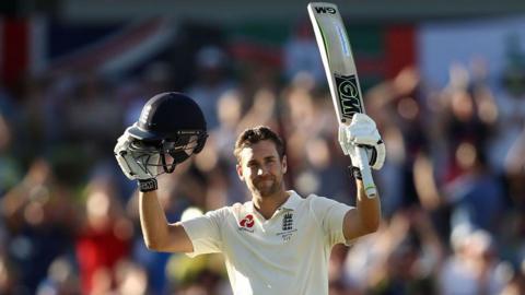 Dawid Malan raising his bat after scoring a century against Australia in 2017