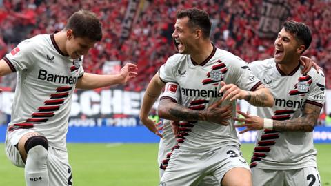 Bayer Leverkusen players celebrate