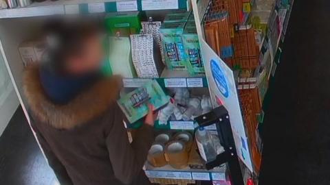 CCTV images of thieves in Adrian Bhagat's shop, in Nottingham