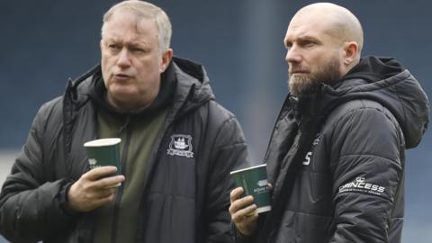 Neil Dewsnip (left) stands with former Argyle head coach Ian Foster