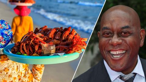 a plate of lobster and Ainsley Harriott