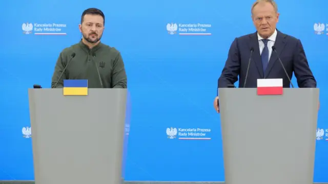 Prime Minister Donald Tusk (R) and Ukrainian President Volodymyr Zelenski (L) during a press conference at the Chancellery in Warsaw, Poland,