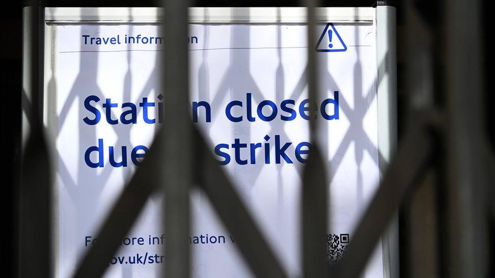 A sign indicates a closed tube station in London