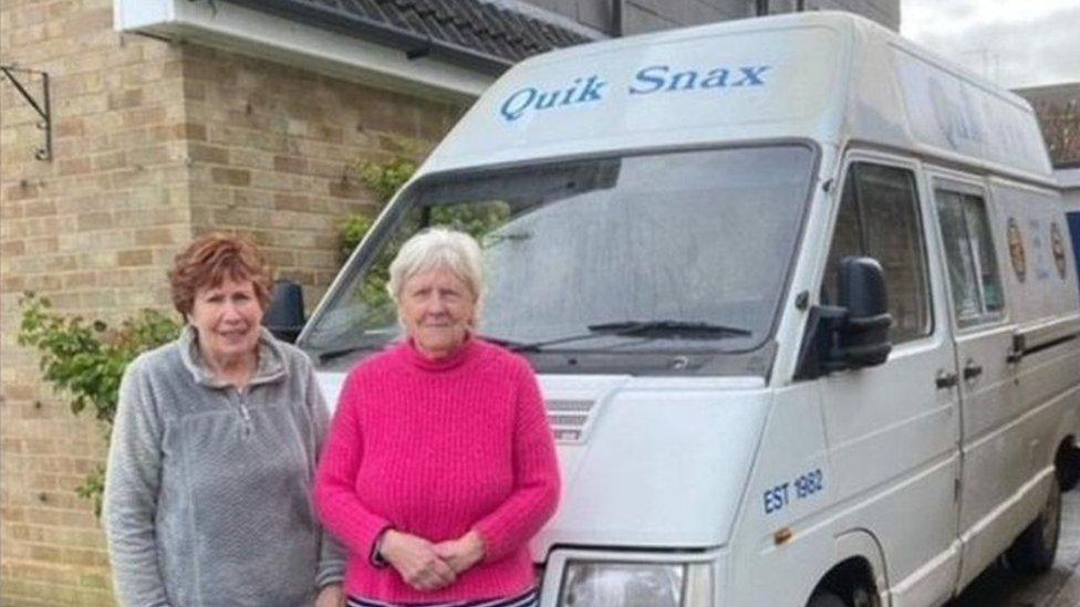 Eileen Smart and Pam Sutton next to van