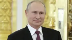 Путин