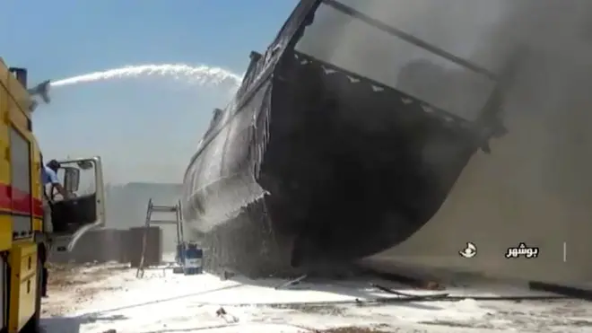 Screengrab taken from Iranian state TV showing ship on fire at shipyard in Bushehr, Iran (15 July 2020)