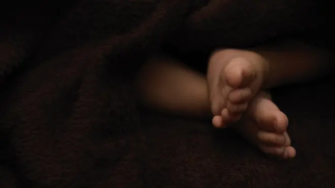 A newborn baby's feet