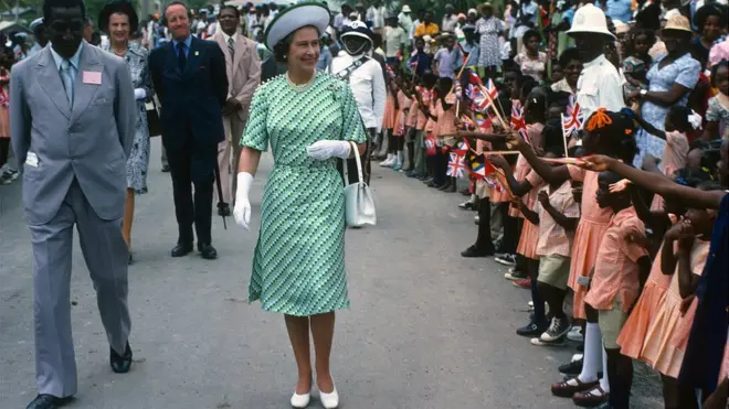 Queen Elizabeth ll is greeted by the public during a walkabout in Barbados on November 01, 1977 in Barbados