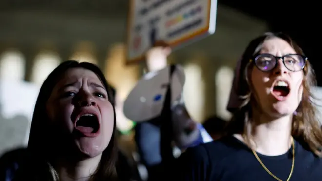 Protesters react outside the US Supreme Court after the draft opinion was leaked