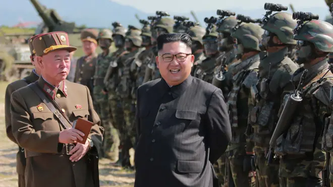 This undated photo released by North Korea's official Korean Central News Agency (KCNA) on August 26, 2017 shows North Korean leader Kim Jong-Un (C) presiding over a target strike exercise conducted by the special operation forces of the Korean People's Army (KPA) at an undisclosed location