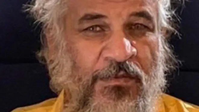 Handout photo from Iraq's Security Media Cell showing Sami Jasim al-Jaburi after his capture (11 October 2021)