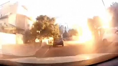 Flash of light after rocket hits a residential area in northern Israel.