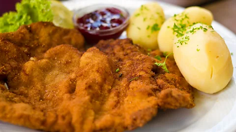 richardschramm/Getty Images The Wiener schnitzel one of Vienna's most quintessential dishes (Credit: richardschramm/Getty Images)