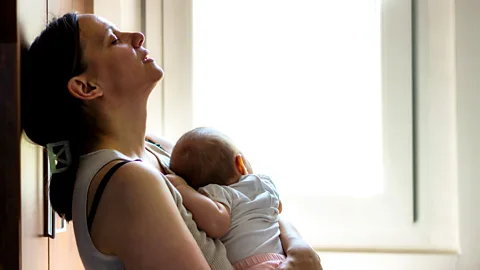 Getty Images Even if they don't talk about it, many mums feel mixed emotions about parenthood (Credit: Getty Images)