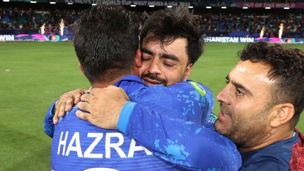 Rashid Khan celebrates Afghanistan's win over Bangladesh to reach the T20 World Cup semi-final