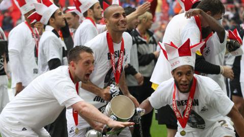 Stephen Dobbie, Darren Pratley and Ashley Williams with the play-off trophy