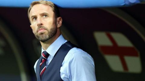 Gareth Southgate looks on