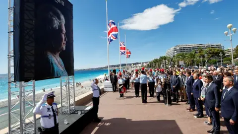 Reuters Image shows mourners on the Nice beachfront