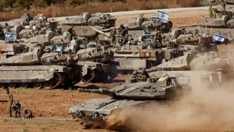 Reuters Israeli tanks near Gaza