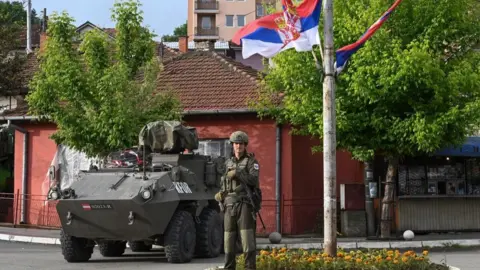 EPA Nato peacekeepers in the northern Kosovo town of Zvecan , 1 june