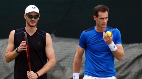 Andy Murray and Jamie Murray practising at the All England Club