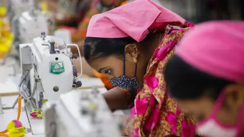 Getty Images Female garment workers