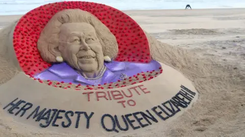 Getty Images A sand sculpture of the Queen