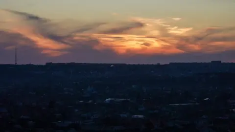 BBC/Joyce Liu Photo of the city of Kharkiv as the sun sets