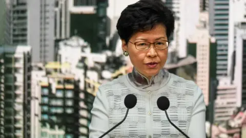 AFP Carrie Lam speaking at a press conference