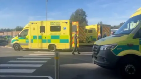 Ambualnces in a hospital car park